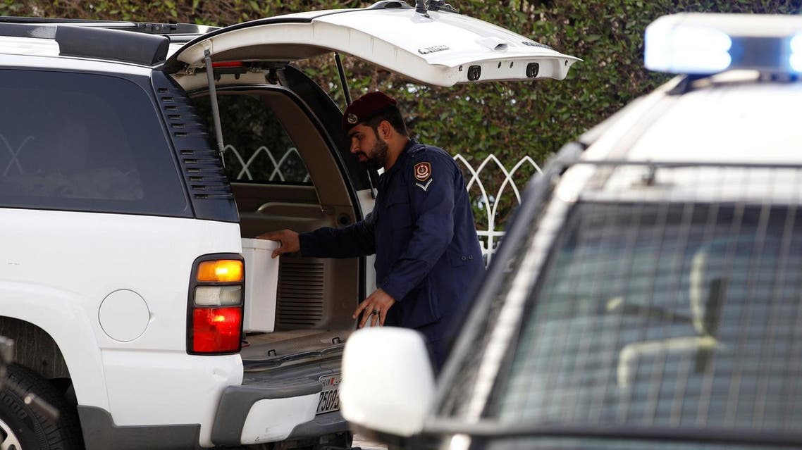 Police inspect cars at a checkpoint, during a manhunt for prisoners that escaped from Muharraq jail, in Manama, Bahrain, June 4, 2016. REUTERS