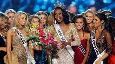Deshauna Barber (C) of the District of Columbia celebrates with other contestants after being crowned Miss USA 2016 during the 2016 Miss USA pageant at the T-Mobile Arena in Las Vegas, Nevada, U.S., June 5, 2016. REUTERS