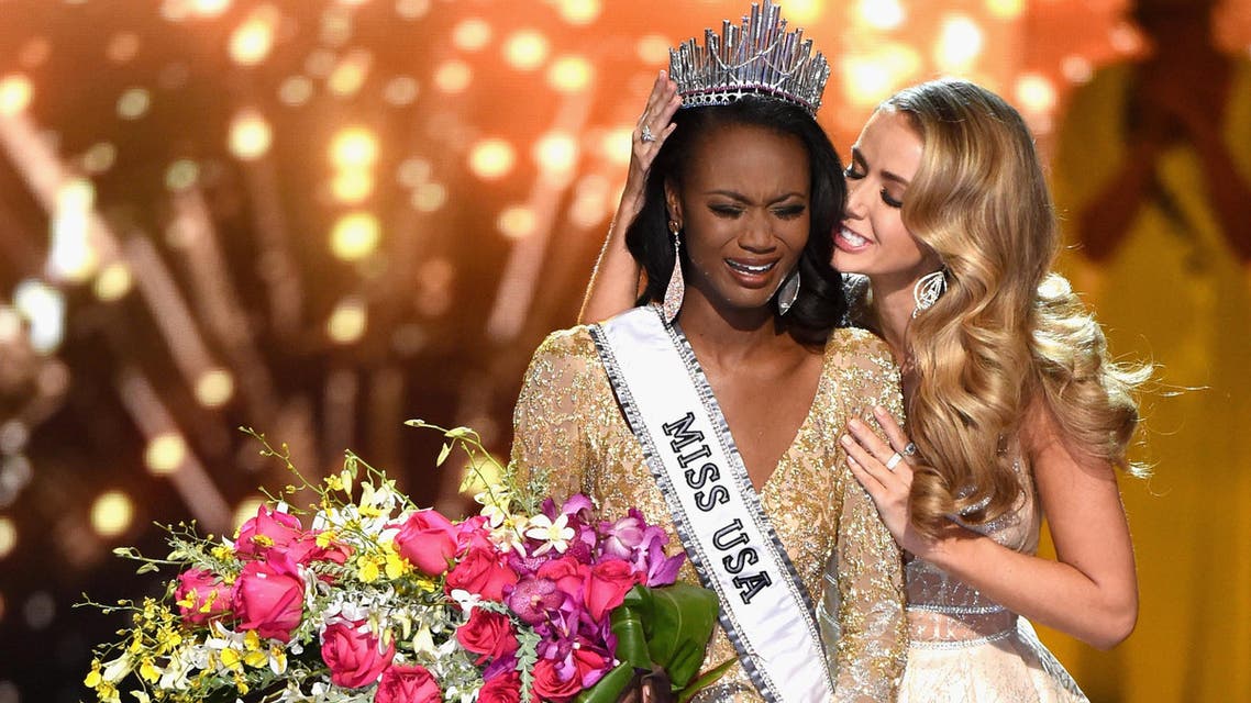 LAS VEGAS, NV - JUNE 05: Miss District of Columbia USA 2016 Deshauna Barber reacts as she is crowned Miss USA 2016 by Miss USA 2015 Olivia Jordan during the 2016 Miss USA pageant at T-Mobile Arena on June 5, 2016 in Las Vegas