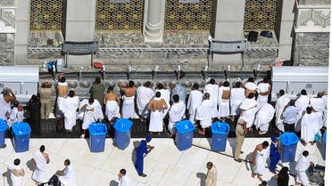 Muslim pilgrims drink Zamzam water before the Friday prayer inside the Grand Mosque, in Mecca, Saudi Arabia, Friday, Nov. 4, 2011. The annual Islamic pilgrimage draws three million visitors each year, making it the largest yearly gathering of people in the world. The Hajj will begin on November 5. (AP)