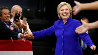 Eight years later, Clinton ready to break one glass ceiling  