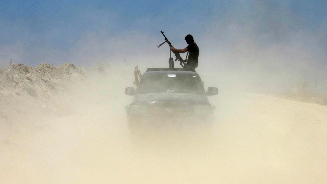 rebels fighting against both ISIS and the government of President Bashar al-Assad said ISIS fighters had pulled out of an area near the border. (AP)