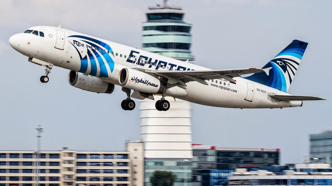 This August 21, 2015 file photo shows an EgyptAir Airbus A320 with the registration SU-GCC taking off from Vienna International Airport, Austria. Egyptians officials say a bomb threat has forced an EgyptAir airliner en route to Beijing from Cairo to make an emergency landing in Uzbekistan, where the aircraft is being searched. (AP Photo/Thomas Ranner, File)