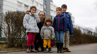 n this March 15, 2016 picture Nahrouz Ramadan poses with his four children from left: Nazdar, Mustafa, Nerjis and Masaoud, prior to an interview with The Associated Press in Berlin, Germany. (File photo: AP)