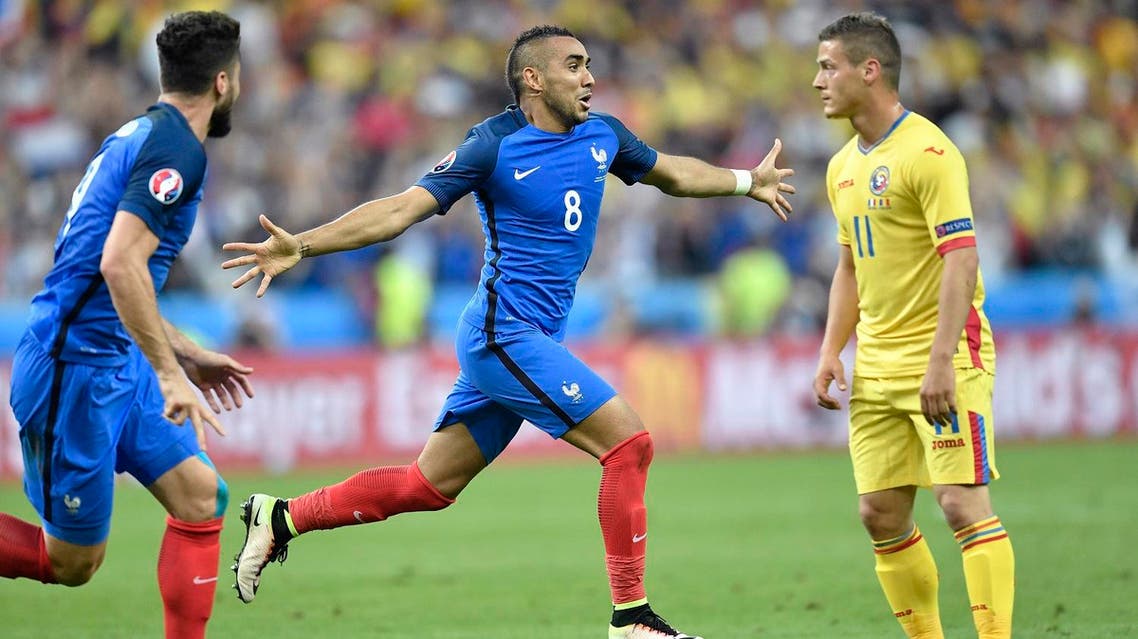 France's Dimitri Payet, center, celebrates after scoring his side’s second goal during the Euro 2016 Group A soccer match between France and Romania, at the Stade de France, in Saint-Denis, north of Paris, Friday, June 10, 2016. (AP)