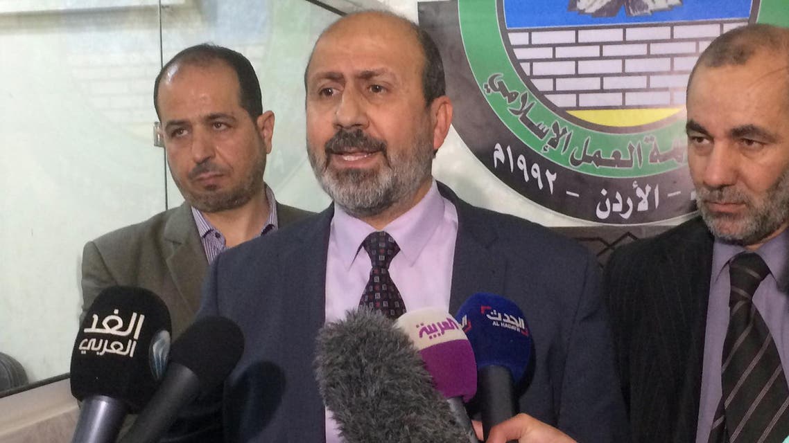 Murad Adaileh spokesman for the Islamic Action Front, second left, Jordan’s largest registered political party, speaks to journalists following a raid by security forces on his organization, in Amman, Jordan, Sunday, April 17, 2016. (AP)