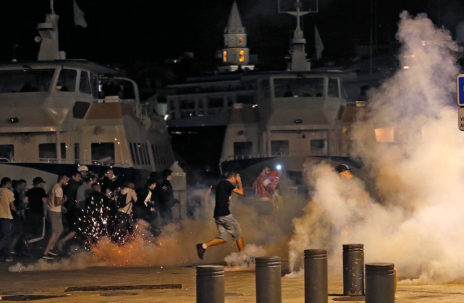 Marseille, France 11/6/16 Police disperse revellers at the old port of Marseille after the England v Russia - Group B match. REUTERS