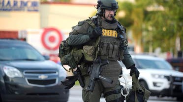 An Orange County Sheriff’s Department SWAT member arrives to the scene of a fatal shooting at Pulse Orlando nightclub in Orlando, Florida, Sunday, June 12, 2016 (Photo: AP)