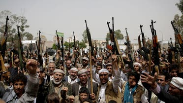 Shiite Houthi tribesmen hold their weapons as they chant slogans during a tribal gathering showing support for the Houthi movement, in Sanaa, Yemen, Thursday, May 26, 2016. (AP)