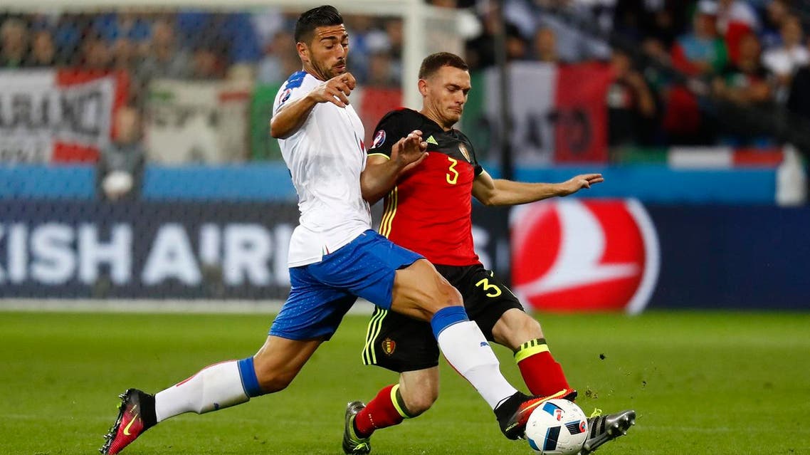 Belgium's Thomas Vermaelen in action with Italy's Graziano Pelle REUTERs
