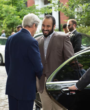 US Secretary of State John Kerry (L) greets Saudi Deputy Crown Prince Mohammed bin Salman outside Kerry's residence prior to their meeting on June 13, 2016. (AFP)