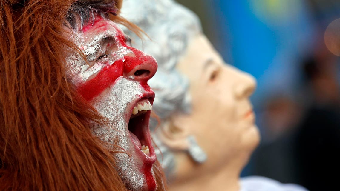England supporters celebrate their 2-1 win at the end of the Euro 2016 Group B soccer match between England and Wales, in Bordeaux's fan zone, France, Thursday, June 16, 2016. (AP)