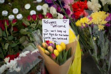 A message and floral tributes for Jo Cox (Photo: AP)