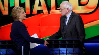 Sanders vows to work with Clinton to defeat Trump