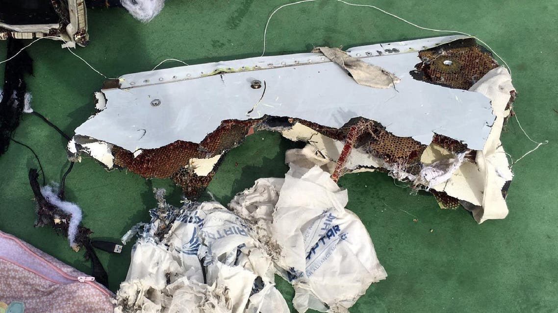 This picture uploaded on the official Facebook page of the Egyptian military spokesperson on May 21, 2016 and taken from an undisclosed location reportedly shows some debris that the search teams found in the sea after the EgyptAir Airbus A320 crashed in the Mediterranean AFP