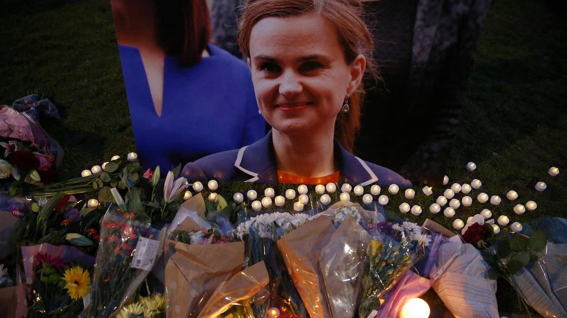 Tributes for Labour Party MP Jo Cox, who was shot dead in the street in northern England, are displayed on Parliament Square in London, Britain, June 16, 2016. REUTERS
