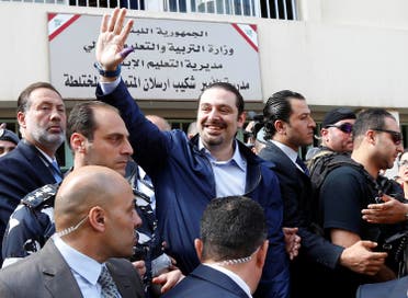 Lebanon's former Prime Minister Saad al-Hariri greets his supporters after casting his ballot at a polling station during Beirut's municipal elections, Lebanon, May 8, 2016. REUTERS
