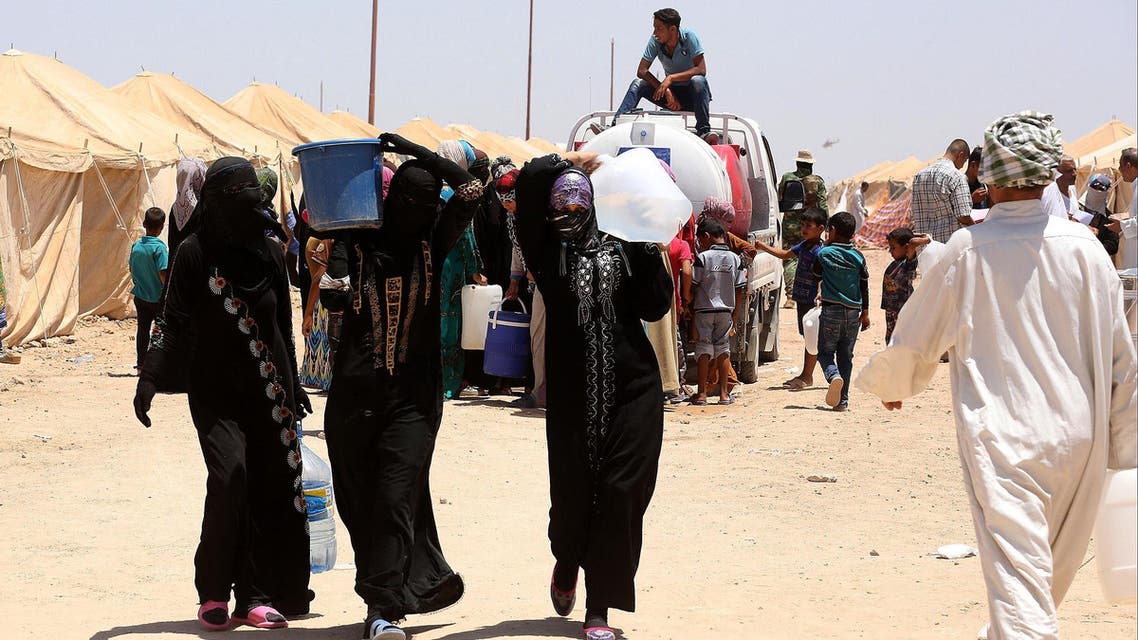Internally displaced Iraqis at a camp outside Fallujah, Iraq, Monday, June 14, 2016. AP