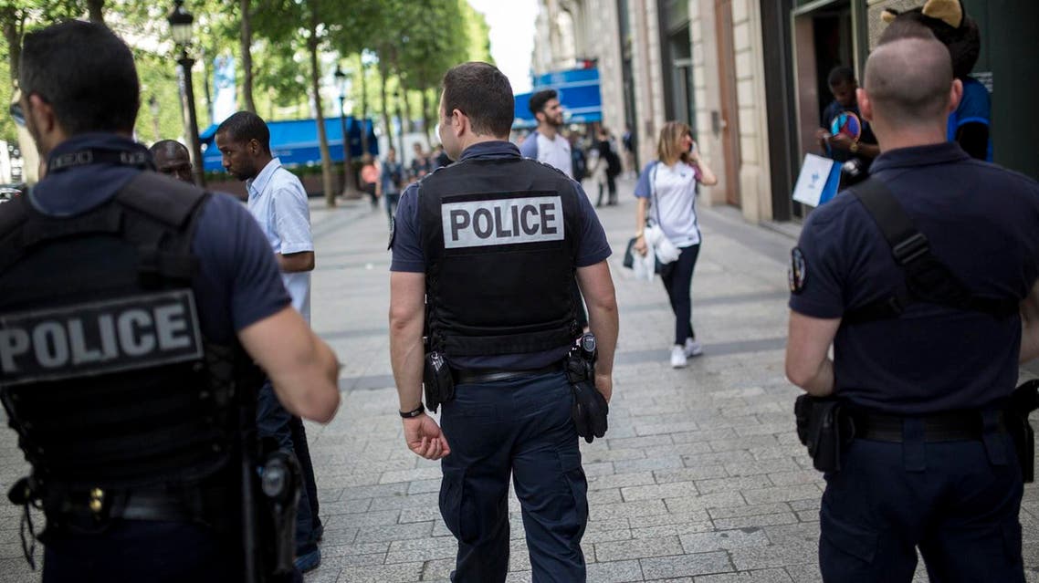 Two men linked to French police killer charged | Al Arabiya English