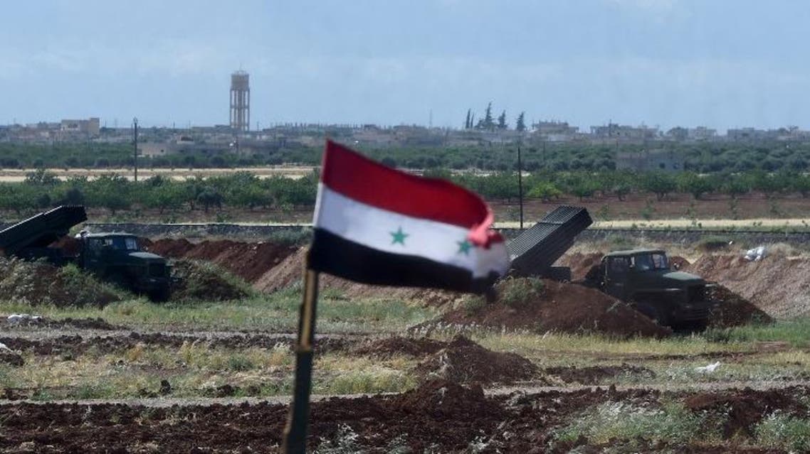 A battery of the Syrian Army's Russian made the BM-21 multiple rocket launcher is visible in Hama province, in the northwest of Syria on May 4, 2016. (AFP)