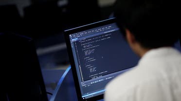 A student, who requested to be known only by surname Noh and his face not to be photographed due to security reasons, sits in front of a computer while demonstrating softwares during an interview with Reuters at War Room at The Korea University in Seoul, South Korea, June 16, 2016. REUTERS