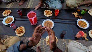 A Muslim prays before breaking his fast during the Islamic month of Ramadan at a mosque in Peshawar, Pakistan, Wednesday, June 8, 2016. (AP)
