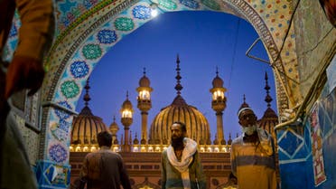 People leave Jamia Mosque after the evening prayer and breaking their fast during the Islamic month of Ramadan, in Rawalpindi, Pakistan, Monday, June 13, 2016. (AP)