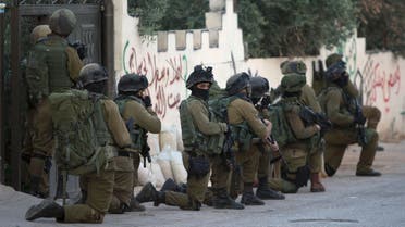 Israeli troops deploy during an army operation at West Bank village of Salem, near Nablus, Monday, May 30, 2016. AP