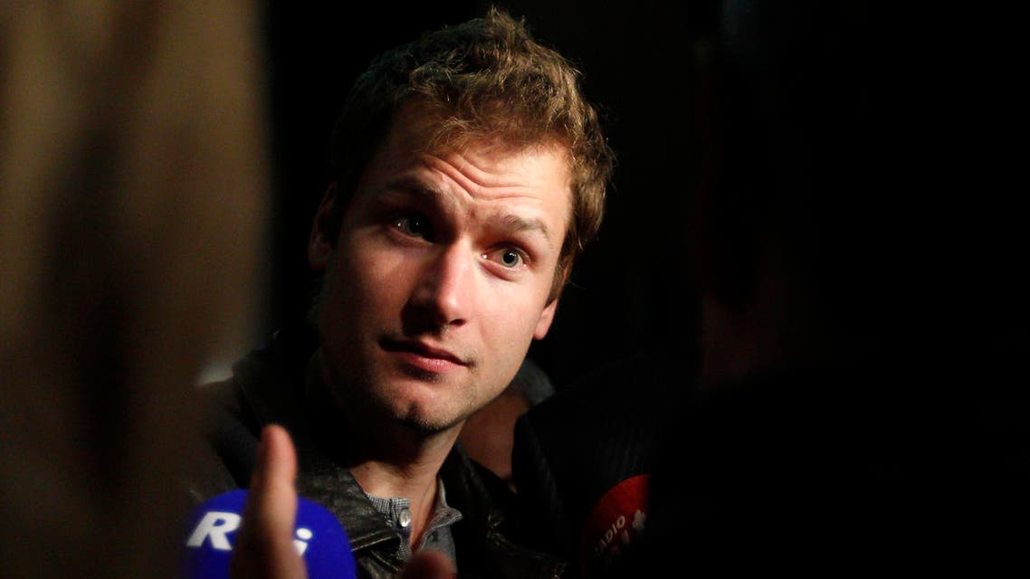 n this Oct. 30 2012 file photo, Italian race walker Alex Schwazer faces reporters as he leaves the Coni (Italian Olympic Committee) headquarters in Rome. ap