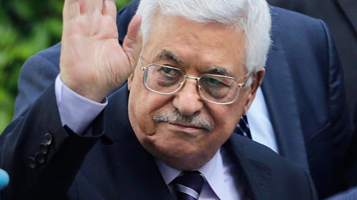 Palestinian President Mahmoud Abbas greets delegations upon his arrival at the Arab League headquarters to attend an emergency Arab League session in Cairo, Egypt, Saturday, May 28, 2016. (AP Photo/Amr Nabil)