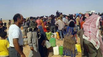 Water reaches Syrian refugees after Jordan border closure 