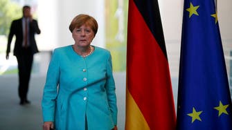 Merkel defends EU, critics talk bloc disintegration