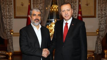 Political Palestinian Hamas leader Khaled Mashal (L) and Turkish President Recep Tayyip Erdogan (R) shake hands hands during their meeting in Istanbul. (File photo: AFP)