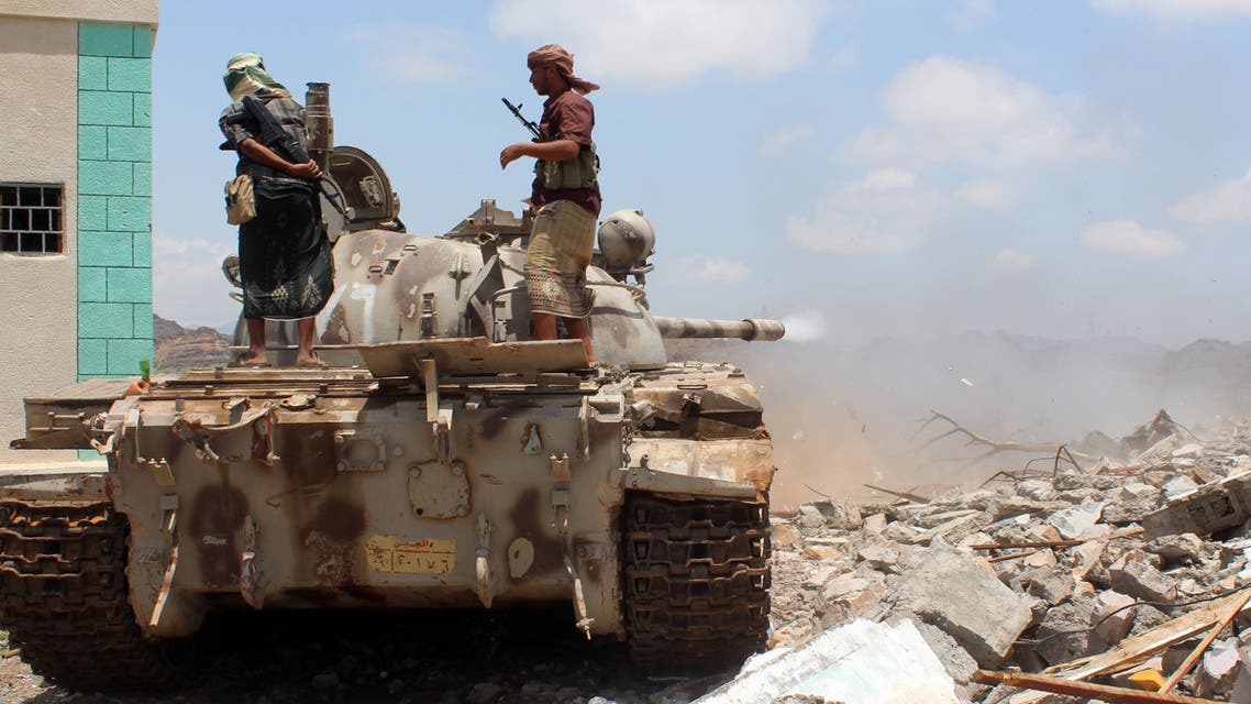 Pro-government forces stand on a tank during clashes with Shiite Huthi militants in Al-Karsh in Yemen's southern Lahj province on May 13, 2016. AFP