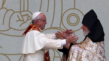 Pope Francis embraces Catholicos of All Armenians Karekin II during an ecumenical service at the Republic Square in Yerevan, Armenia, June 25, 2016. REUTERS