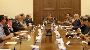 A handout picture released by the Jordanian Royal Palace on June 21, 2016 shows Jordan's King Abdullah II (C) listening to his Military Advisor during an emergency meeting in the capital Amman. (Jordanian Royal Palace / AFP) 