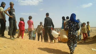 No food, little water for Syrians stranded on Jordan border