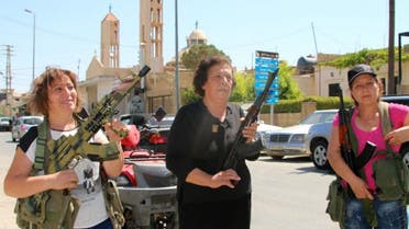 160628080043_lebanese_christian_women_hold_weapons_as_residents_of_the_christian_village_of_al-qaa_640x360_afp_nocredit