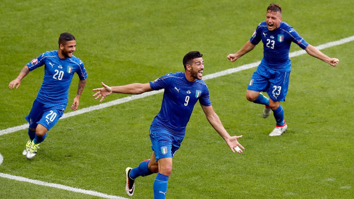 Italy's Graziano Pelle, center, celebrates after scoring his side's second goal during the Euro 2016 round of 16 soccer match between Italy and Spain, at the Stade de France, in Saint-Denis, north of Paris, Monday, June 27, 2016. (AP)
