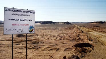 The Friday, April 15, 2016 photo, shows a sign marking the turn-off leading to the Hamama gold exploration site, deep in the desert east of Luxor, Egypt.  AP