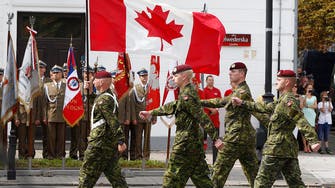 Canada to give troops for NATO force, ready to talk to Russia