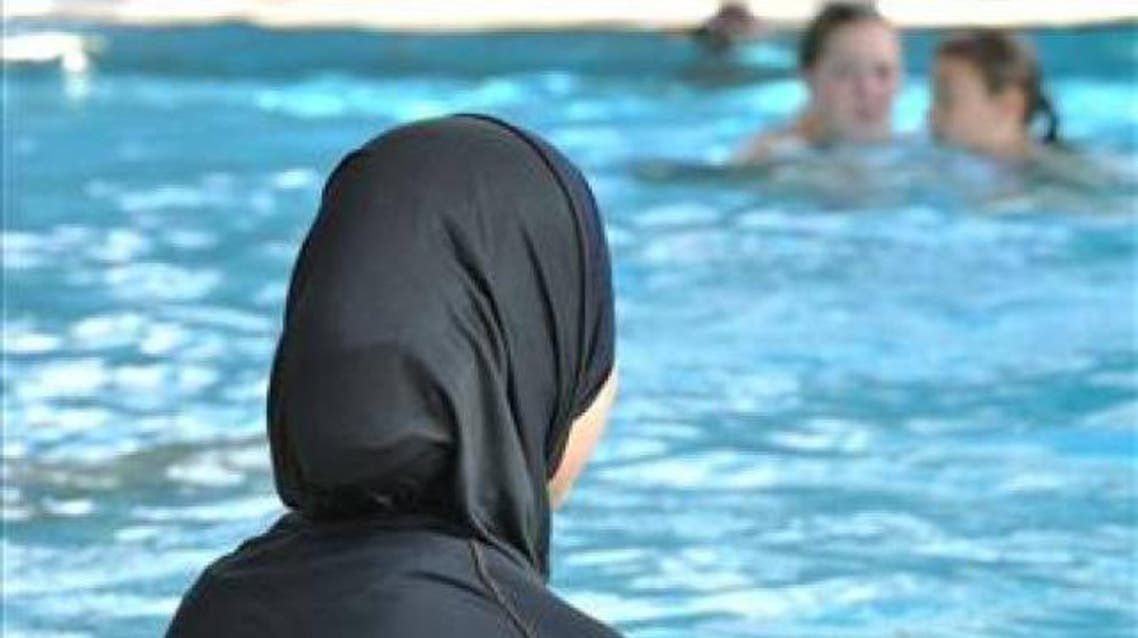 daughter swimming lessons switzerland muslim (Reuters)