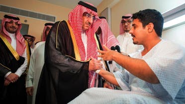 In this photo released by Saudi Press Agency, SPA, Saudi Crown Prince Mohammed bin Naif bin Abdulaziz, center, and other officials visit a security officer, who was injured when a suicide bomber attacked a Jeddah mosque Monday, at a hospital in Jeddah, Saudi Arabia (Photo: Saudi Press Agency via AP)