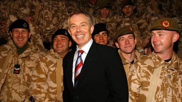 Britain's Prime Minister Tony Blair (C) visits British troops in Basra, southern Iraq December 17, 2006. Picture taken December 17, 2006. (Reuters)