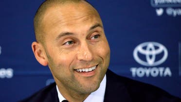 In this Sept. 28, 2014, file photo, New York Yankees' Derek Jeter speaks to the media after the last baseball game of his career, against the Boston Red Sox, at Fenway Park in Boston. AP