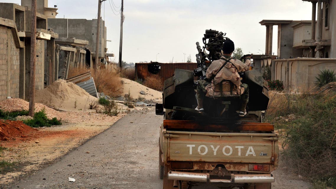 In this March 7, 2016 file photo, a man loyal to the Libyan armed forces prepares himself for clashes with Islamic State group militants west of Benghazi, Libya. (AP)
