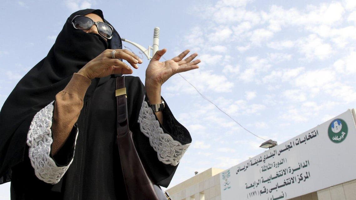 A woman gestures as she leaves a polling station after casting her vote during municipal elections, in Riyadh, Saudi Arabia December 12, 2015. (Reuters)