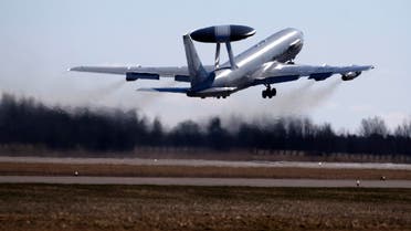 NATO Airborne Warning and Control System (AWACS) aircraft take off near Vilnius, Lithuania, Tuesday, April 1, 2014.  (AP)