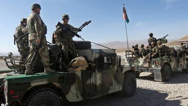 Afghan National Army (ANA) soldiers on the back of a Humvee patrol outside their base in Logar province, Afghanistan February 16, 2016. (Reuters)