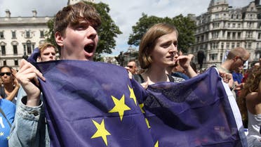 People hold flags during a 'March for Europe' demonstration against Britain's decision to leave the European Union, in central London, Britain July 2, 2016. (Reuters)